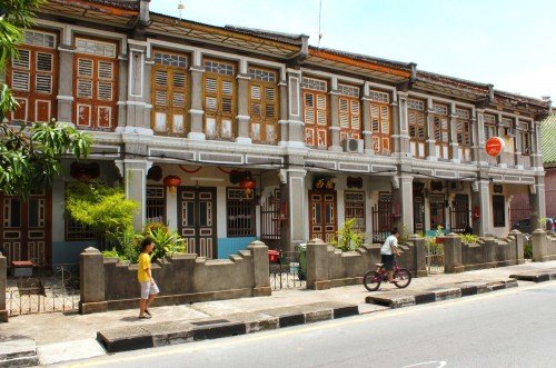 A row of restored traditional shophouses along Armenian Street in George Town, Penang (Photo from The Romance of the Grand Tour)