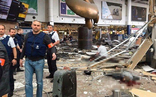 Chaos inside Brussels airport after two consecutive explosions that left over 20 people dead and scores injured. (Photo from Telegraph UK)
